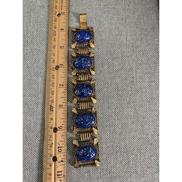 unknown Jewelry - Vintage Gold toned metal link bracelet with deep blue cabochons speckled with go